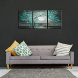 Teal plum blossom wall art displayed as a 12x16" framed canvas set above a modern couch.