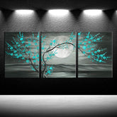 Teal plum blossom wall art 12x16" framed canvas set with a moonlit background and turquoise blossoms.
