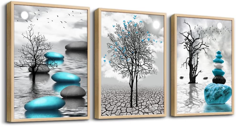 modern abstract canvas wall art featuring blue stones and barren trees in a tranquil water setting