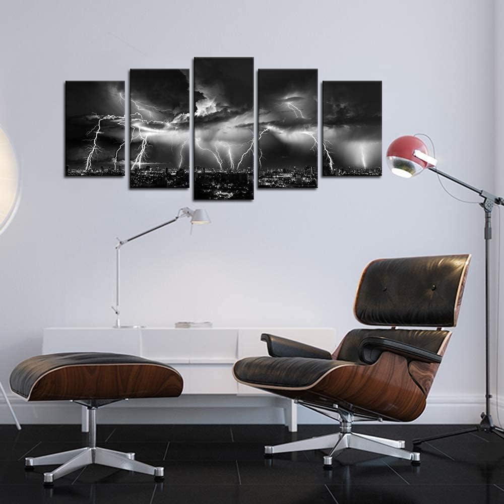 Black and white lightning wall art depicting a stormy city night view in a modern interior setting.