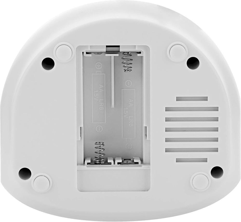 Back view of a digital clock radio with dual alarms showing battery compartment.