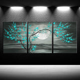 Teal plum blossom wall art 12x16" framed canvas set with a moonlit background and turquoise blossoms.