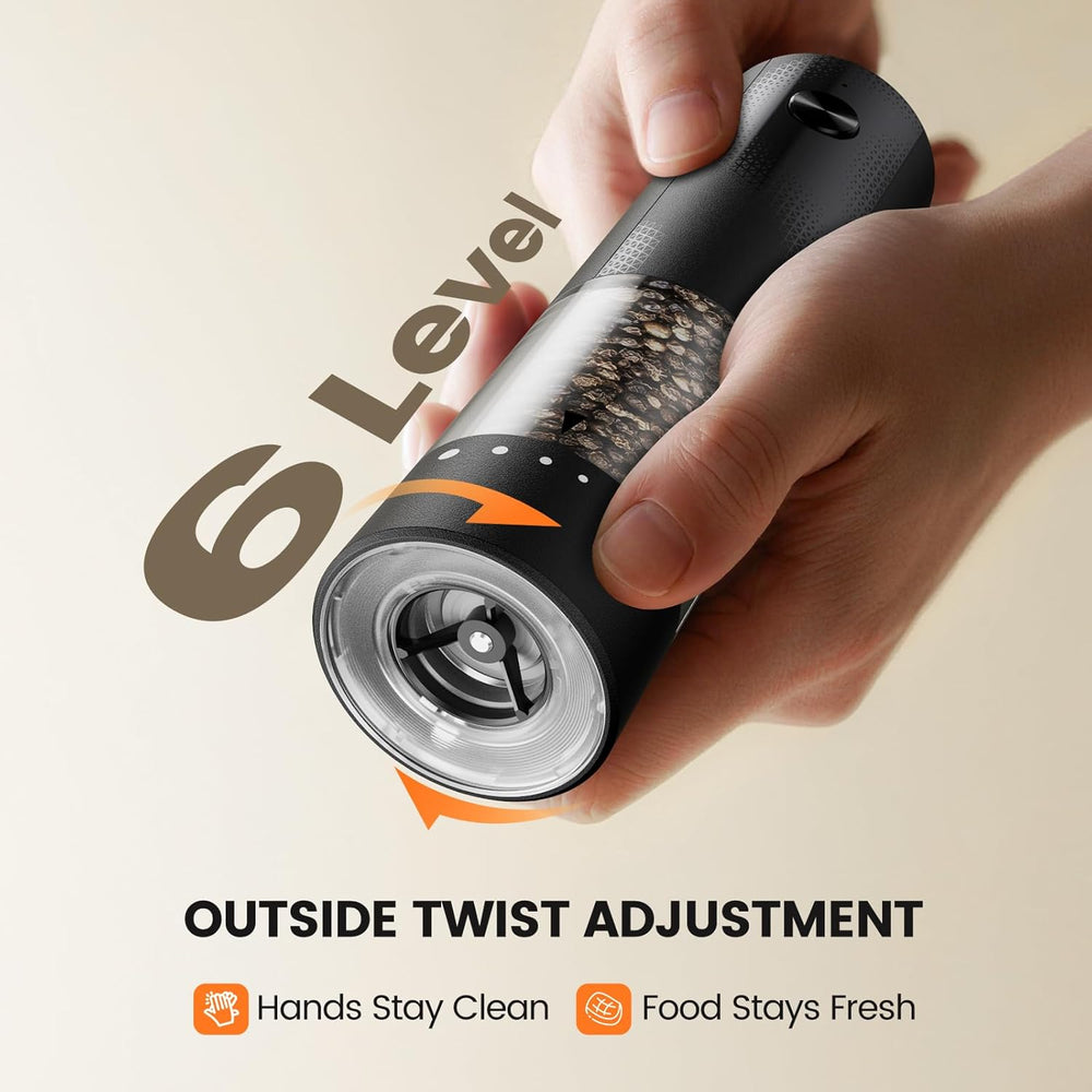 Hand adjusting the 6-level twist of an electric salt and pepper grinder set | Rechargeable Automatic for easy seasoning.
