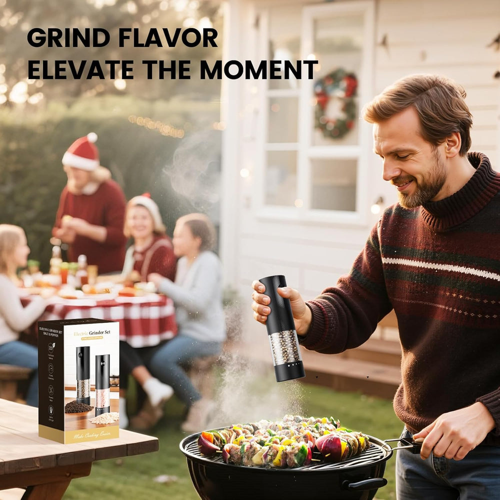 Electric salt and pepper grinder set in use while grilling with friends outdoors, enhancing flavors.