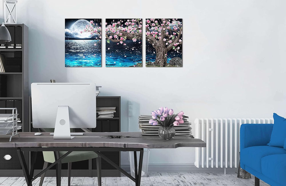 3 piece canvas wall art set featuring a pink tree and moon decor, enhancing a modern office space.