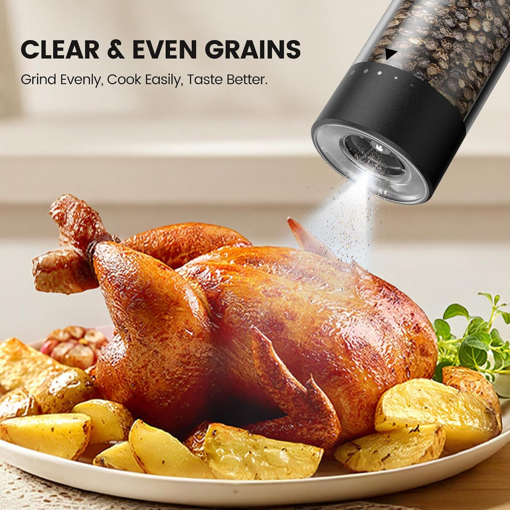 electric salt and pepper grinder set on roasted chicken with vegetables, showcasing clear and even grain grinding.